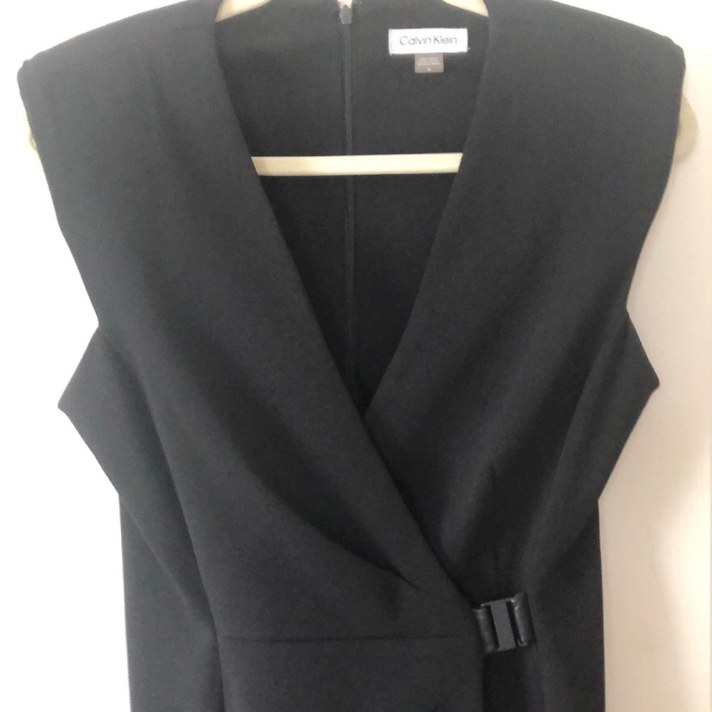 Really cute black Calvin Klein dress, with leather buckle. Great fitting!